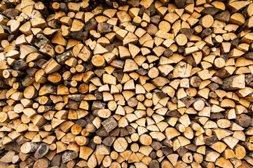 Pile of chopped fire wood prepared for winter