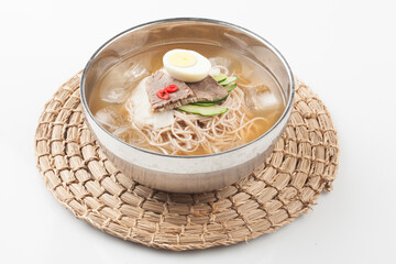 A food made by cutting cucumbers into small pieces, pickling them in salt or soy sauce, adding them...