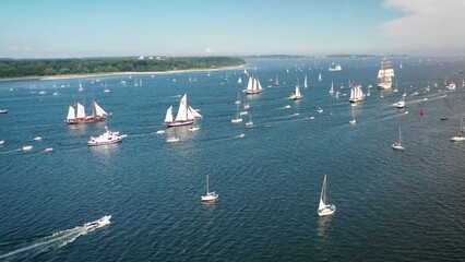 Tall ships passing Kieler Förde to Kiel week. Parade of sailing ships during Kiel Week, Kiel Fjord, Schleswig-Holstein, Germany.

