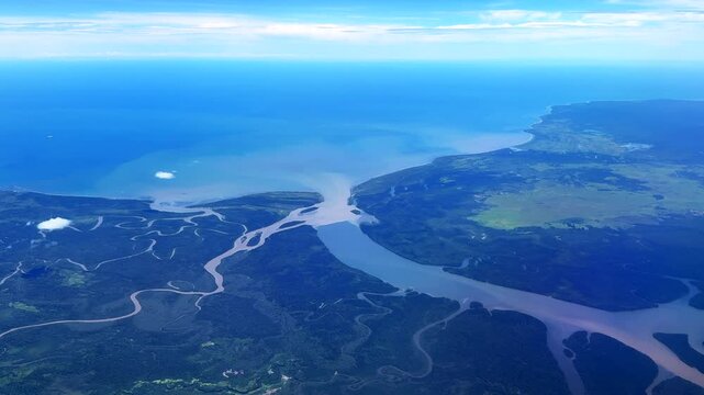 Gulf Province rivers fingers Kerema Port Moresby aerial drone Papua New Guinea Air Nyuguni high altitude travel landscape view clouds Highlands PNG Kimora aviation National Capital district pan
