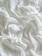 Obraz premium A close-up view of a bed with white sheets, suitable for use in interior design or lifestyle photography