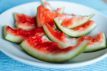 watermelon rinds with leftover watermelon on plate