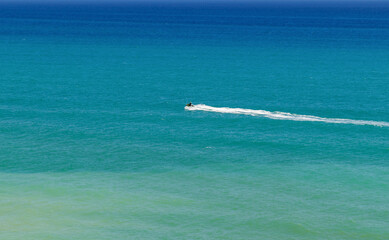 Jet Ski in the mediterranan sea, by the shore of Torremolinos, Spain