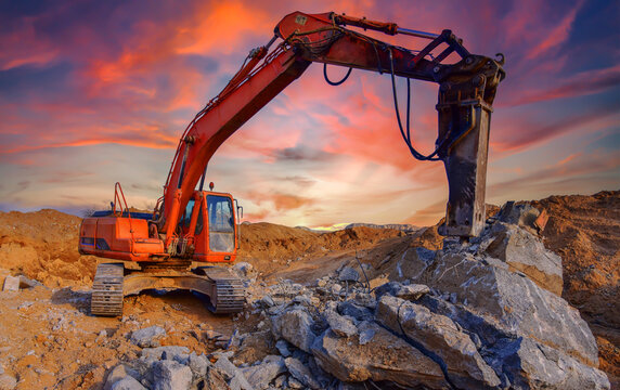 Excavator jackhammer for demolition. Excavator hydraulic breaker hammer for concrete destruction, hard rock at construction site or quarry. Hydraulic Breaker Hammer Jack Hammer. Demolishing concrete.