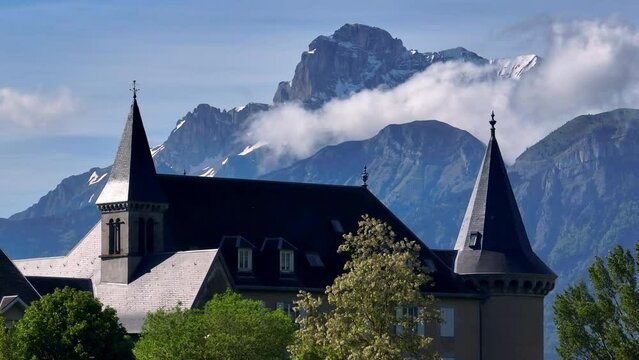 Elevated perspective of La Mure showcasing its quaint architecture and natural surroundings
