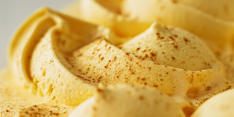 Luxurious saffron and cardamom ice cream, a closeup of luxurious saffron and cardamom ice cream, its rich golden color and exotic spices highlighted against a stark white background