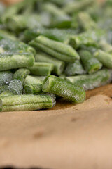 frozen and ice-covered green asparagus beans