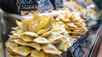 Home made fresh dumpling pasta on farmers market