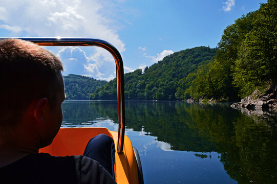 catamaran ride on the lake - first person view - beautiful scenery on a sunny day