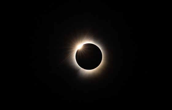 Solar Eclipse April 2024 diamond ring effect just prior to totality viewed in New Brunswick, Canada.