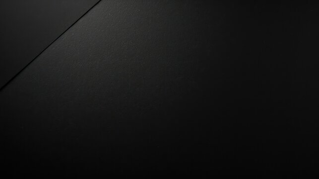 sleek and minimalistic dark abstract background with subtle texture and intersecting lines perfect for modern design projects and elegant themes.