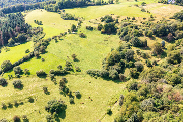 Aerial panorama of the low mountain landscape near Greifenstein in Hesse