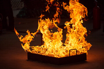 Cropped view of people in fire extinguishing approach training