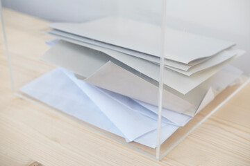 election ballot paper in transparent ballot box, political parties, voting rights, civic duty,...