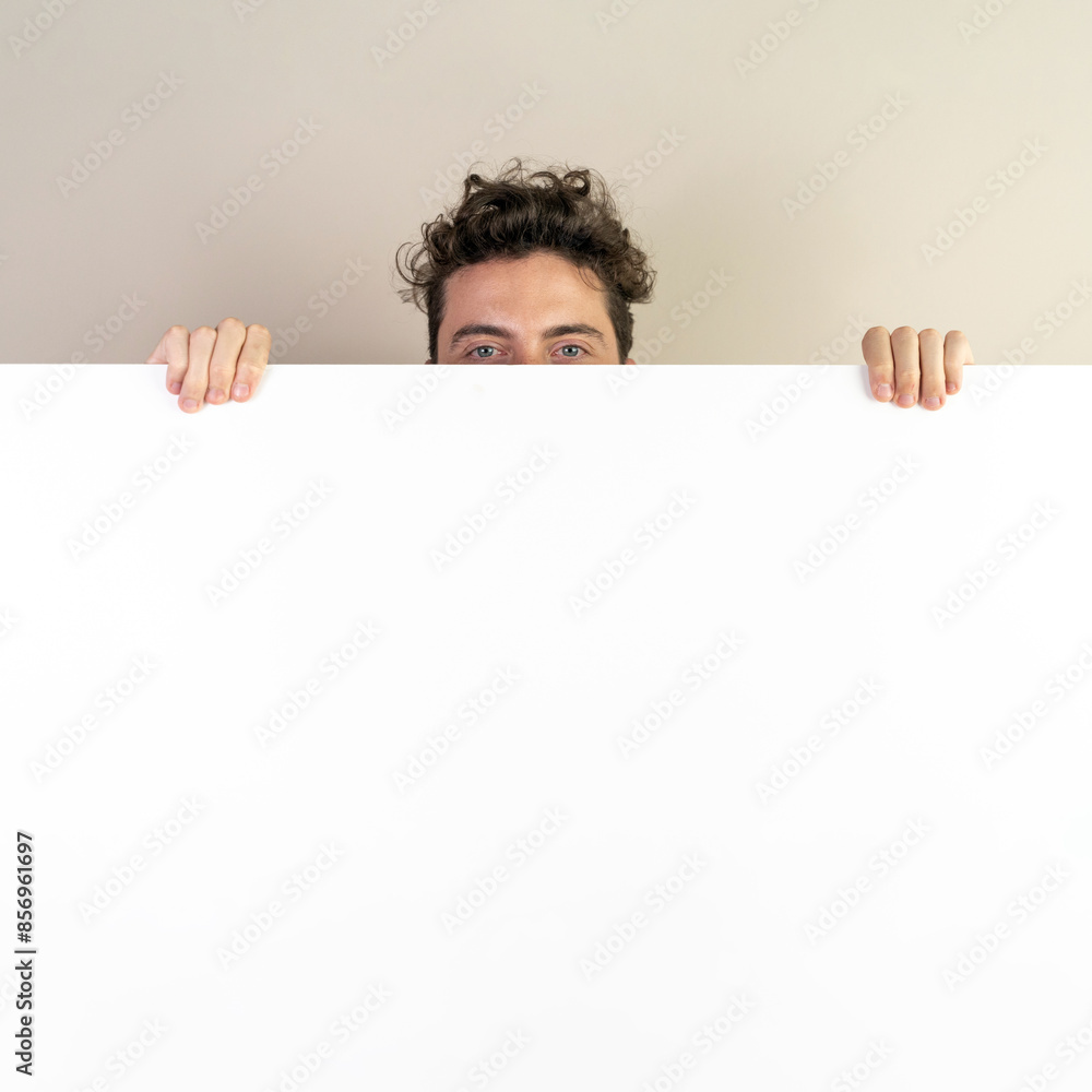 Wall mural hidden face behind blank sign - ideal for presentations and promotions