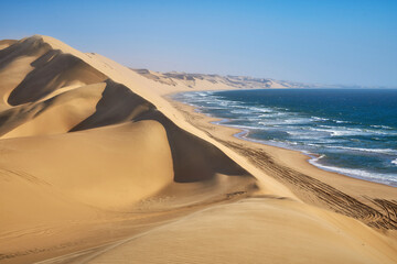 Ocean coast in the dunes near Walvis Bay in Namibia
