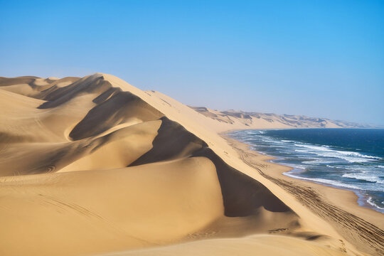 Dunes and the ocean coast near Walvis Bay in Namibia