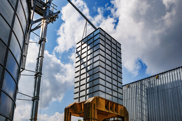 silos on agro-industrial complex with seed cleaning and drying line for grain storage