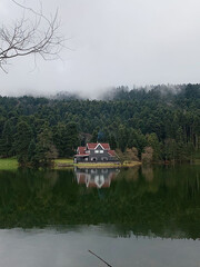 Fototapeta premium Black house on the lake