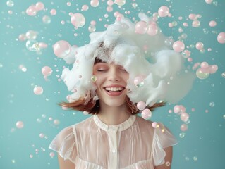Fototapeta premium A happy woman with foam and bubbles on her head, smiling against a light blue background, portraying a sense of joy, whimsy, and playfulness.