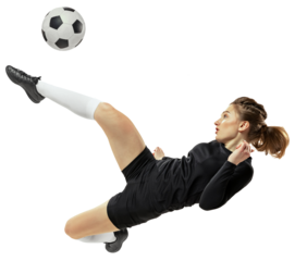 Dynamic image of competitive soccer player, young girl in black uniform hitting ball in motion and falling down isolated on transparent background. Concept of sport, competition, tournament, game