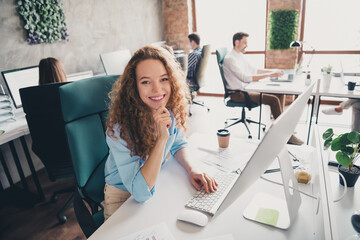 Photo of sit table minded computer teamwork young people working together employees modern industrial open space style interior workplace
