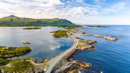 An aerial view of the Atlantic Road in Norway, showcasing the winding road that connects a series...