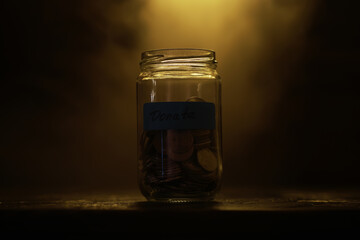 Jar of Coins Labeled 