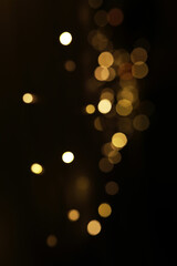 Abstract Defocused Yellow Lights on Dark Background - Modern and Artistic Bokeh Effect in Photography