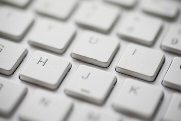 Close-Up of White Keyboard Keys in Modern Minimalist Design