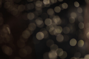 Golden Bokeh Background with Warm Light Circles and Abstract Blur Effect