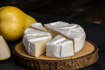 melted cheese with white mold on the table