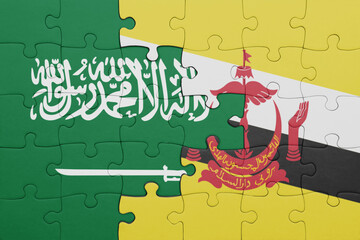 puzzle with the colourful national flag of brunei and flag of saudi arabia.