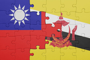 puzzle with the colourful national flag of brunei and flag of taiwan .