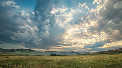 Visualize a serene countryside beneath a blanket of stratocumulus clouds, their low-lying layers creating a soft and diffused light that bathes the landscape in a gentle glow.