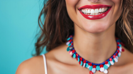 close-up of healthy white teeth, the woman wearing the red, white, and blue necklace, 4th of July dentist appointment