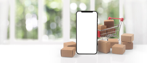 smartphone with shopping cart and a box © denphumi