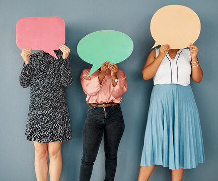 Business people, face and speech bubble on wall background for social media chat or communication. Group cover for anonymous forum or quote for opinion, ideas and feedback with mockup space in studio