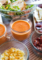 Spanish Salmorejo with Assorted Tapas on a Table