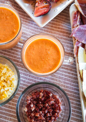 Spanish Salmorejo with Assorted Tapas on a Table