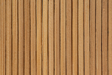 close up of light brown mat made of bamboo sticks