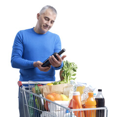 Man doing grocery shopping and buying wine