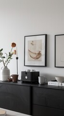 "A Minimalist Home Decor Scene Featuring a Sleek Black Chair Against a White Wall in High-Resolution"
