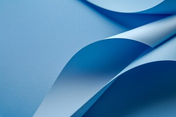 Blue background with curved paper elements showcasing smooth texture and elegance