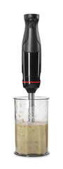 Hand blender with mixture of ingredients isolated on white