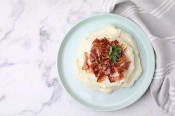 Fried bacon, mashed potato and parsley on white marble table, top view. Space for text