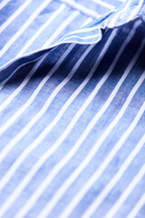 Close up of men's linen shirt. Soft focus.	