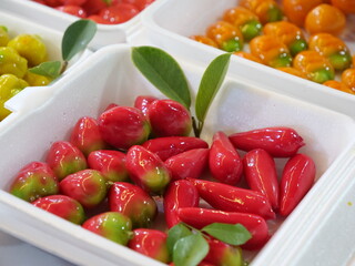 Luk Chub is a Thai dessert made from beans molded into shapes and coated with several layers of jelly.