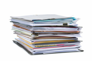 A neatly stacked pile of various documents and files, secured with paper clips, symbolizing organization and paperwork.
