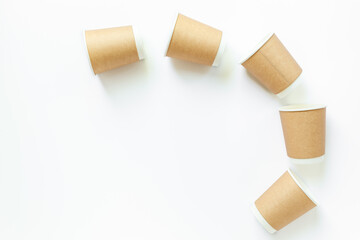 Disposable paper coffee cups, top view. Eco-friendly zero waste products